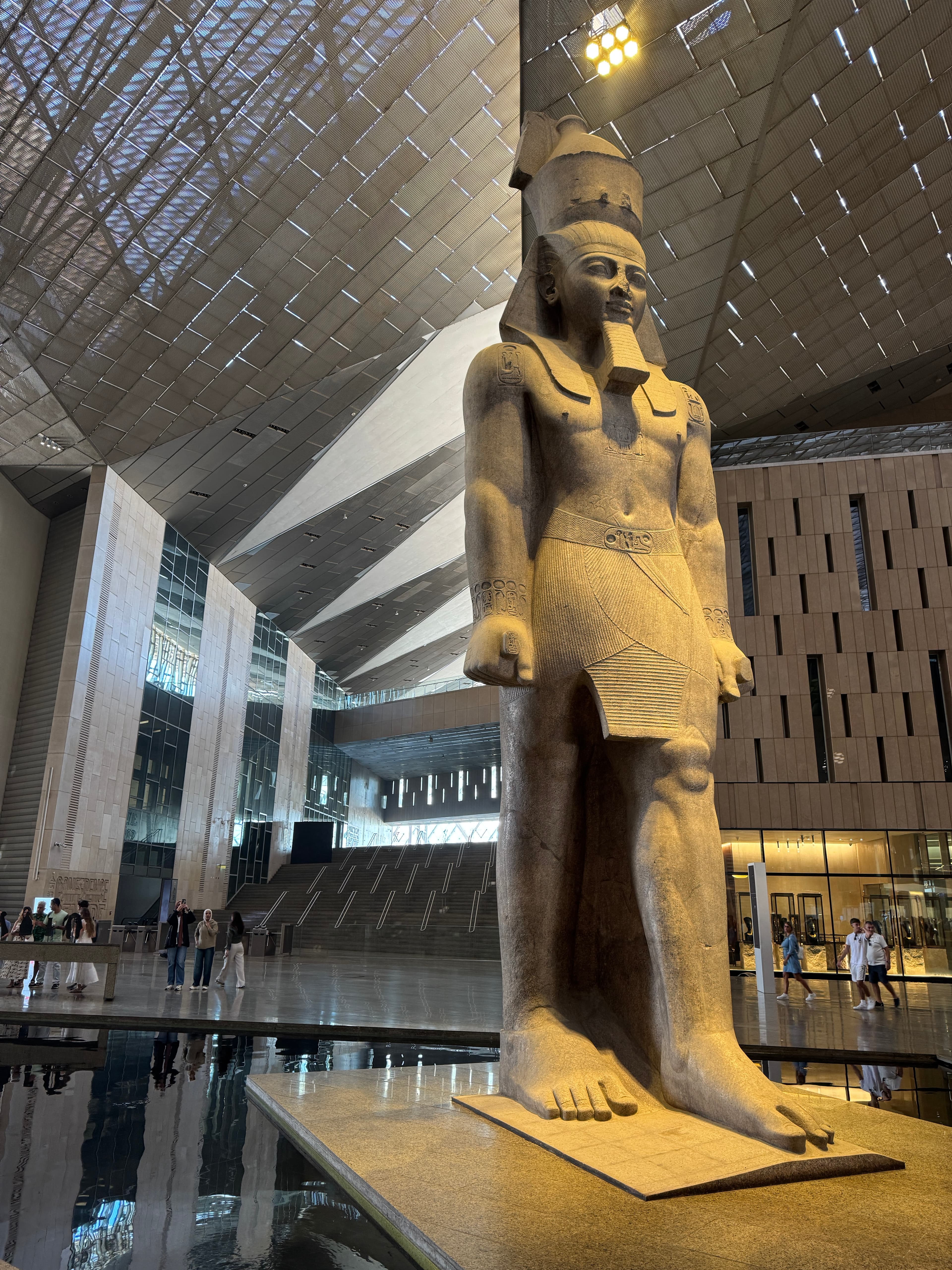 Monumental ancient Egyptian statue in the Grand Egyptian Museum