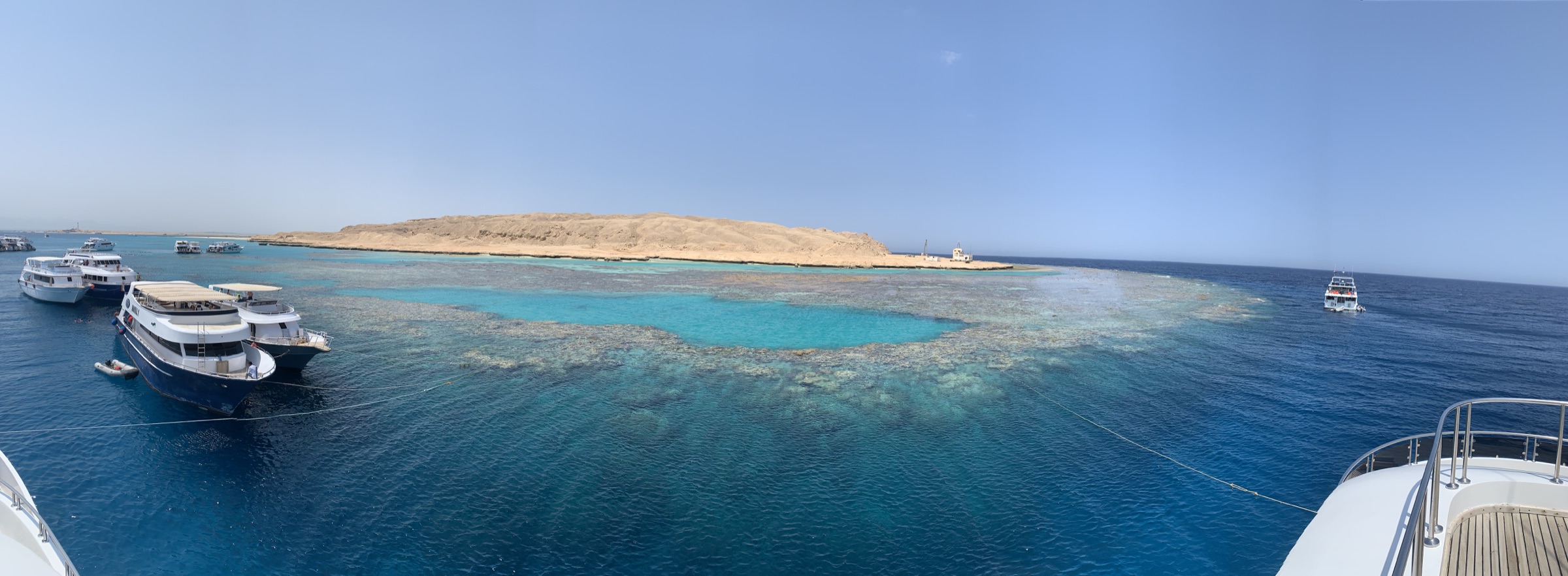 Clear Red Sea water and coral reef at a snorkeling area